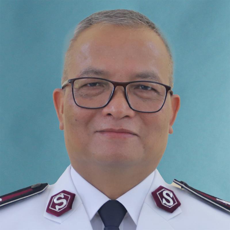 Headshot of Commissioner Lalhmingliana Hmar