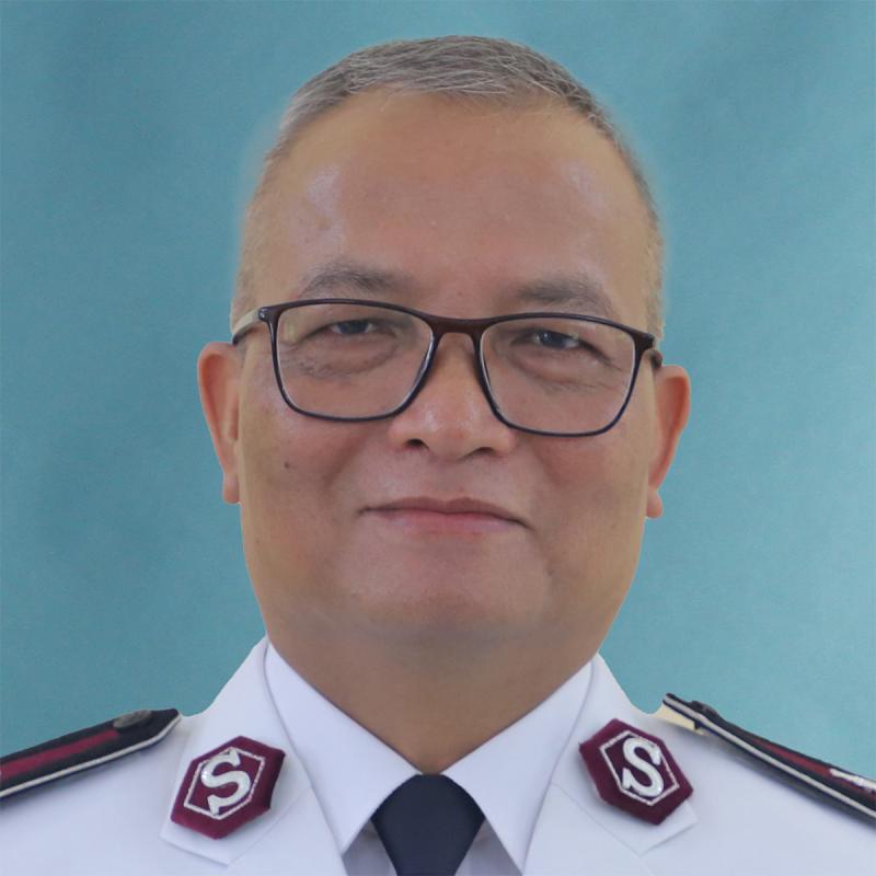 Headshot of Commissioner Lalhmingliana Hmar