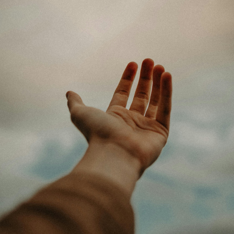 Image of a hand held out