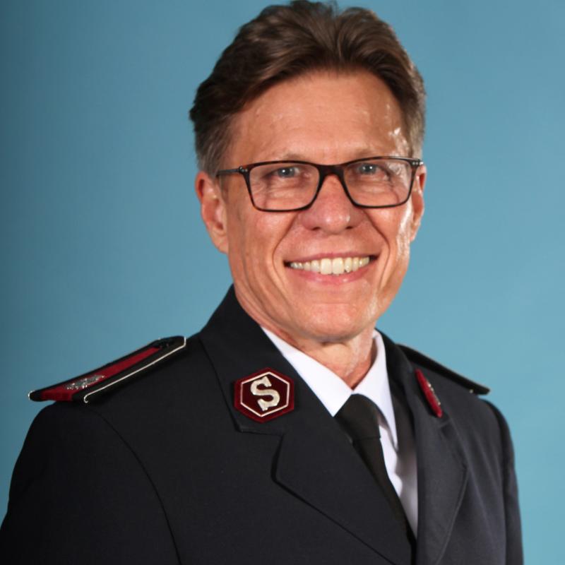 A head and shoulders photo of Commissioner Ted Horwood, wearing his Salvation Army officers uniform