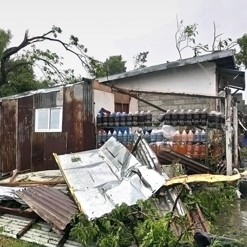 House with roof blown off
